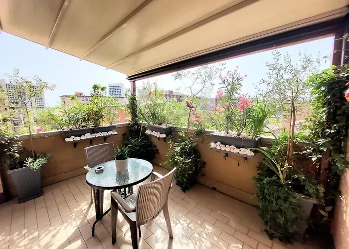 Апартаменты Attico In Fiera